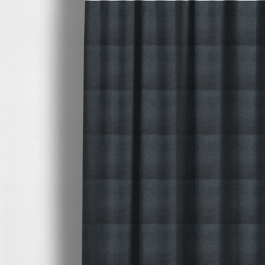The fabric used to create these made-to-measure curtains is a textured woven fabric in a deep slate or dark charcoal grey shade.
