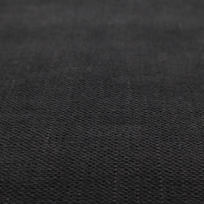 a textured woven fabric in a near-black or extremely dark charcoal shade.