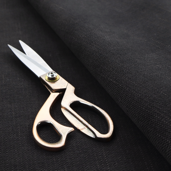a textured woven fabric in a near-black or extremely dark charcoal shade.