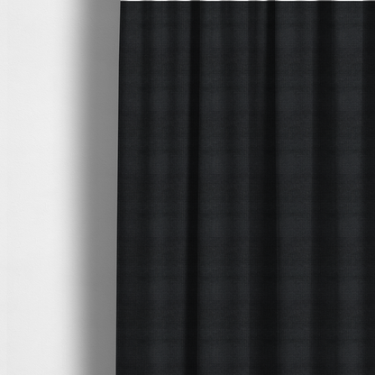 The fabric used to create these made-to-measure curtains is a textured woven fabric in a near-black or extremely dark charcoal shade.