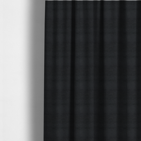 The fabric used to create these made-to-measure curtains is a textured woven fabric in a near-black or extremely dark charcoal shade.