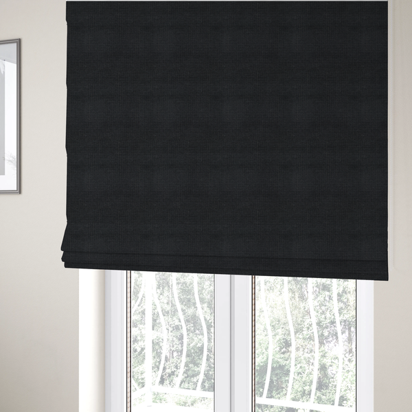 The fabric used to create these Roman blinds is a textured woven fabric in a near-black or extremely dark charcoal shade.