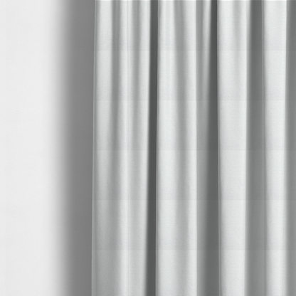 The fabric used to create these made-to-measure curtains is a white woven upholstery fabric with a subtle, textured grain.