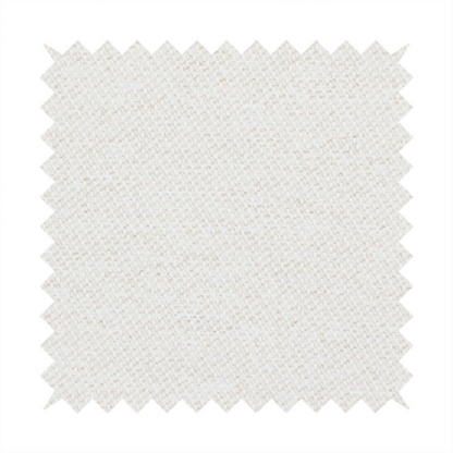 A cream or ivory woven upholstery fabric with a fine, pebble-like texture.