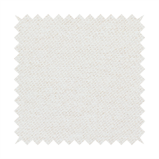 A cream or ivory woven upholstery fabric with a fine, pebble-like texture.