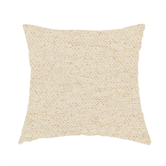 The fabric used to create this handmade cushion is a light beige woven upholstery fabric with a dense, sandy texture.