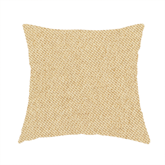 The fabric used to create this handmade cushion is a sandy beige textile featuring a tight diagonal twill weave. The fabric is composed of interlaced cream and light tan threads, creating a fine, granular texture with a matte finish.