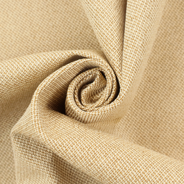A sandy beige textile featuring a tight diagonal twill weave. The fabric is composed of interlaced cream and light tan threads, creating a fine, granular texture with a matte finish.