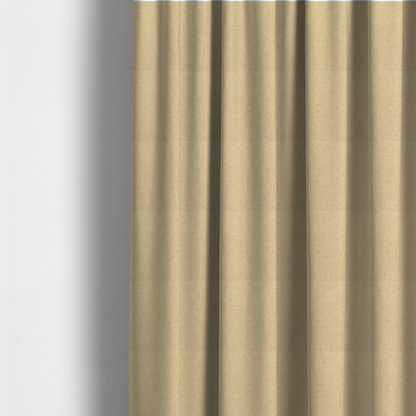 The fabric used to create these made-to-measure curtains is a sandy beige textile featuring a tight diagonal twill weave. The fabric is composed of interlaced cream and light tan threads, creating a fine, granular texture with a matte finish.