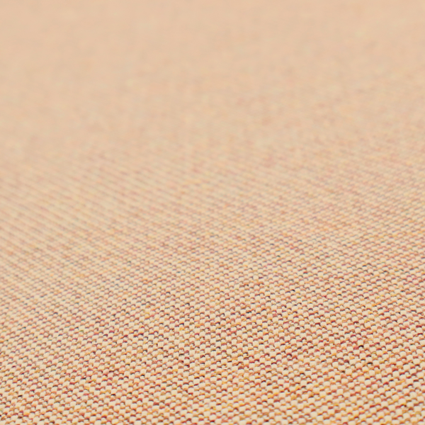 A warm terracotta and peach textile featuring a dense diagonal twill weave. The fabric is a multi-tonal blend of soft orange, muted red, and cream threads, creating a heathered, sun-baked appearance.
