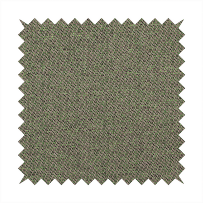 An olive or moss green textile featuring a dense diagonal twill weave. The fabric is a multi-tonal blend, interlacing earthy brownish-grey yarns with vibrant lime green flecks, creating a textured, heathered appearance.