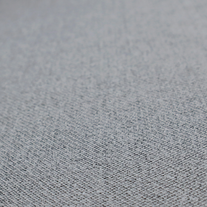 A cool steel or light blue-grey textile featuring a tight diagonal twill weave. The fabric is a multi-tonal blend, interlacing medium grey yarns with pale blue and crisp white threads, creating a clean, heathered appearance.