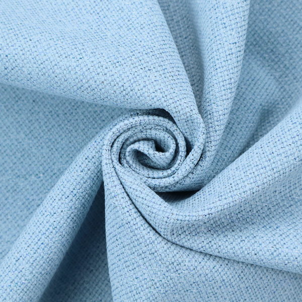 A sky blue or powder blue textile featuring a tight diagonal twill weave. The fabric is woven with bright, airy blue yarns interlaced with crisp white threads, creating a fresh, luminous, and slightly heathered appearance.