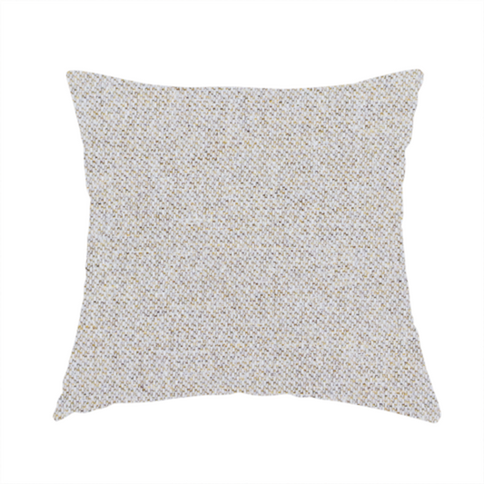 The fabric used to create this handmade cushion is a light oatmeal or pearl grey textile featuring a tight diagonal twill weave. The fabric is a multi-tonal blend, interlacing crisp white and pale grey yarns with subtle flecks of soft gold and charcoal, creating a luminous, heathered appearance.