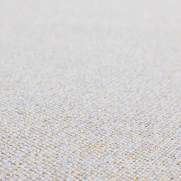 a light oatmeal or pearl grey textile featuring a tight diagonal twill weave. The fabric is a multi-tonal blend, interlacing crisp white and pale grey yarns with subtle flecks of soft gold and charcoal, creating a luminous, heathered appearance.