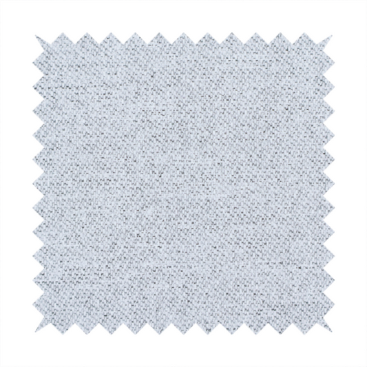 A very pale, cool grey with crisp white and charcoal flecks; bright and airy.
