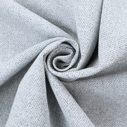 A very pale, cool grey with crisp white and charcoal flecks; bright and airy.