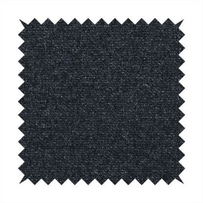 A near-black charcoal base with dense, icy blue and silver flecks.