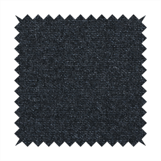 A near-black charcoal base with dense, icy blue and silver flecks.