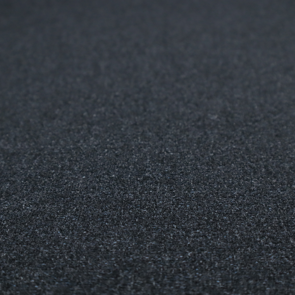 A near-black charcoal base with dense, icy blue and silver flecks.