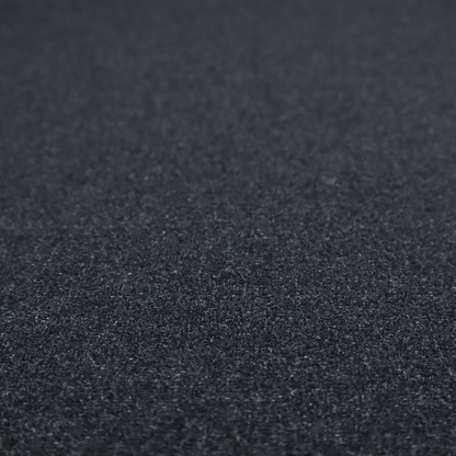 A near-black charcoal base with dense, icy blue and silver flecks.