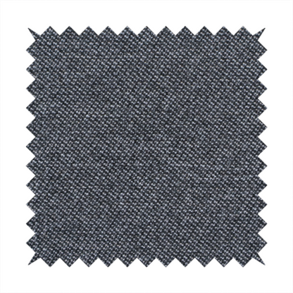 Dark, smoky grey with heavy white flecking; high-contrast heather.