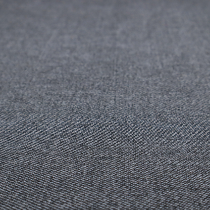 Dark, smoky grey with heavy white flecking; high-contrast heather.