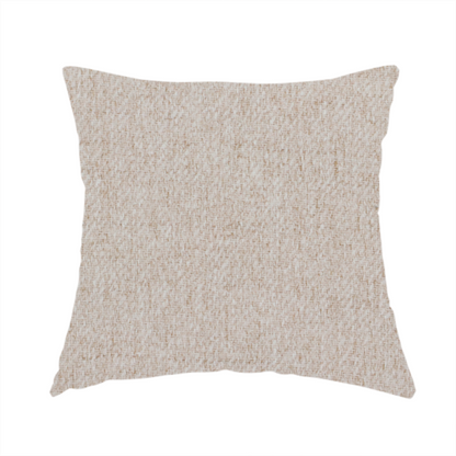 The fabric used to create this handmade cushion is a light beige and tan upholstery fabric with a fine, multi-tonal textured weave.