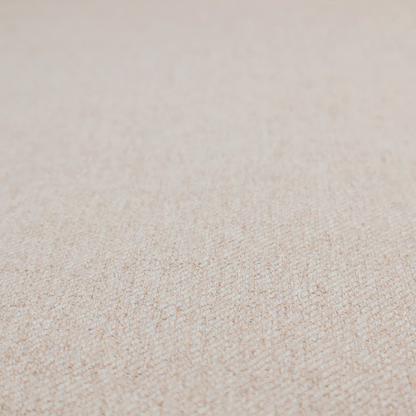 A light beige and tan upholstery fabric with a fine, multi-tonal textured weave.