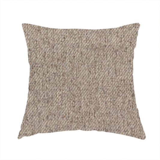 The fabric used to create this handmade cushion is a warm grey and brown upholstery fabric with a dense, diagonal textured weave.