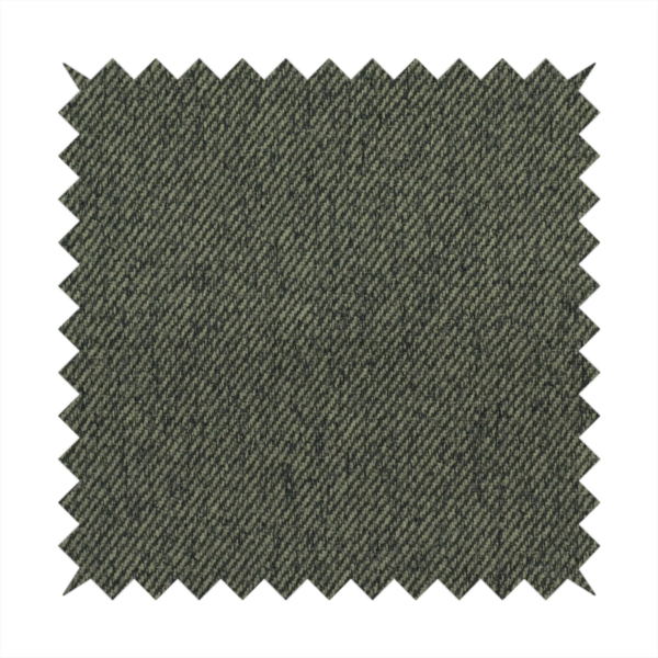 A dark forest green upholstery fabric with a dense, diagonal textured weave.