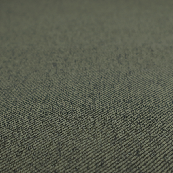 A dark forest green upholstery fabric with a dense, diagonal textured weave.