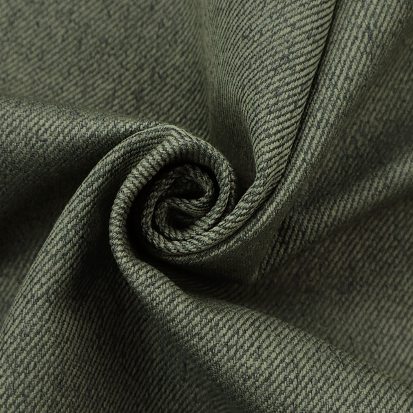 A dark forest green upholstery fabric with a dense, diagonal textured weave.