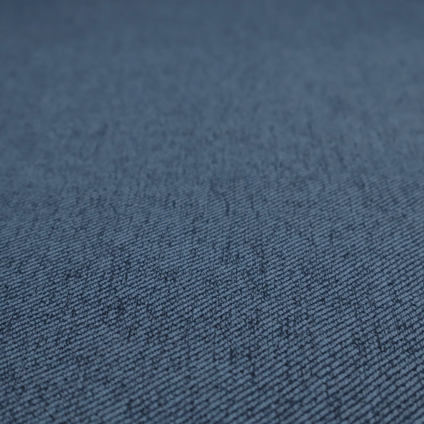 A navy blue upholstery fabric with a dense, diagonal textured weave.