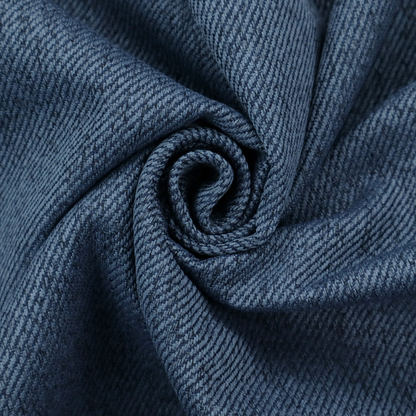 A navy blue upholstery fabric with a dense, diagonal textured weave.