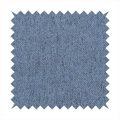 A mid-blue upholstery fabric with a dense, diagonal textured weave.