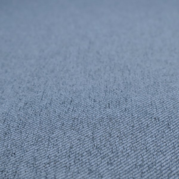 A mid-blue upholstery fabric with a dense, diagonal textured weave.