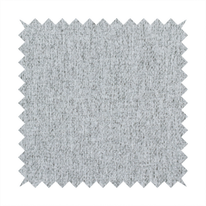 A light grey upholstery fabric with a dense, speckled textured weave.