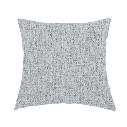 The fabric used to create this handmade cushion is a light grey upholstery fabric with a dense, speckled textured weave.