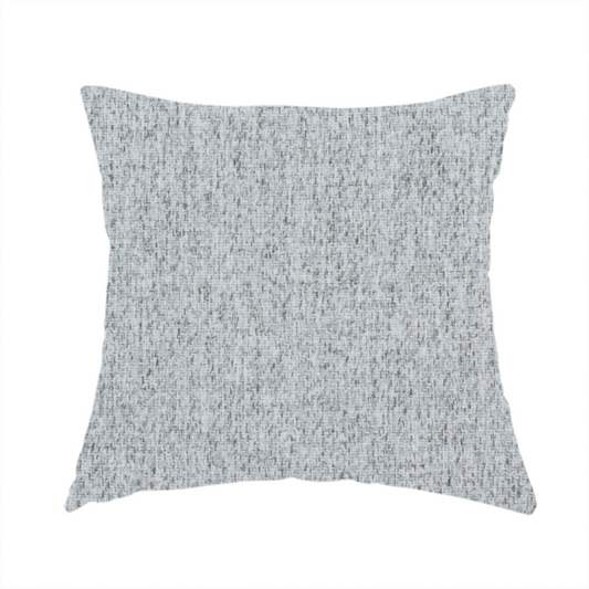 The fabric used to create this handmade cushion is a light grey upholstery fabric with a dense, speckled textured weave.
