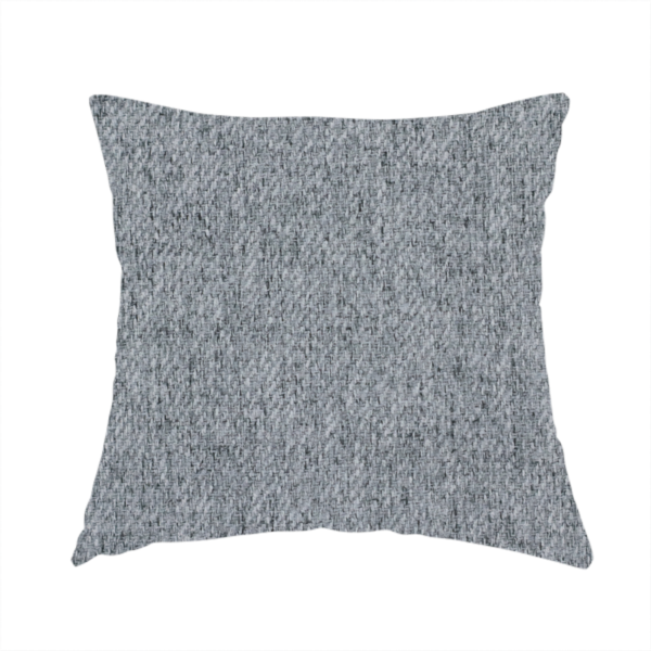 The fabric used to create this handmade cushion is a mid-grey upholstery fabric with a dense, diagonal marled weave.