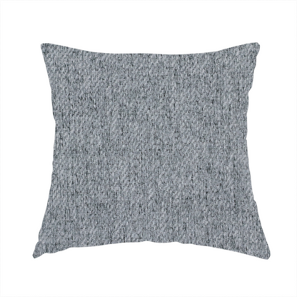 The fabric used to create this handmade cushion is a mid-grey upholstery fabric with a dense, diagonal marled weave.