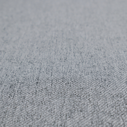 A mid-grey upholstery fabric with a dense, diagonal marled weave.