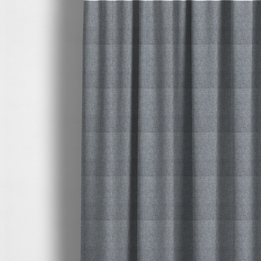 The fabric used to create these made-to-measure curtains is a mid-grey upholstery fabric with a dense, diagonal marled weave.