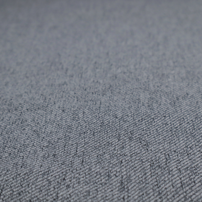 A charcoal grey upholstery fabric with a dense, diagonal textured weave.