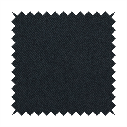 A midnight black upholstery fabric with a dense, diagonal twill weave.