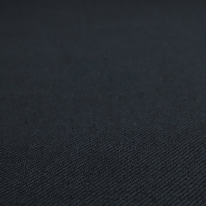 A midnight black upholstery fabric with a dense, diagonal twill weave.