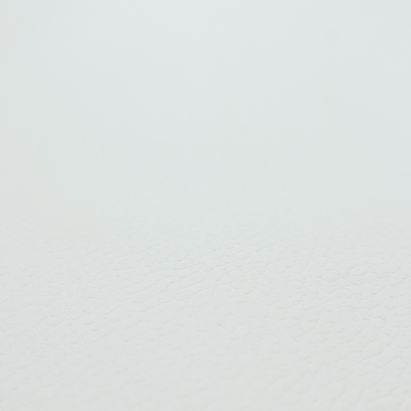 A bright white faux leather fabric featuring a subtle, pebbled texture.