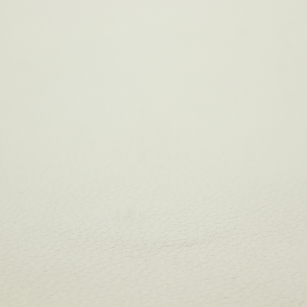 Boston Faux Leather Upholstery Fabric in a warm cream colour, featuring a classic pebbled grain texture.