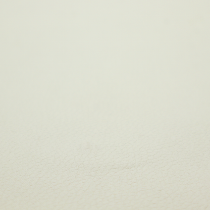Boston Faux Leather Upholstery Fabric in a warm cream colour, featuring a classic pebbled grain texture.